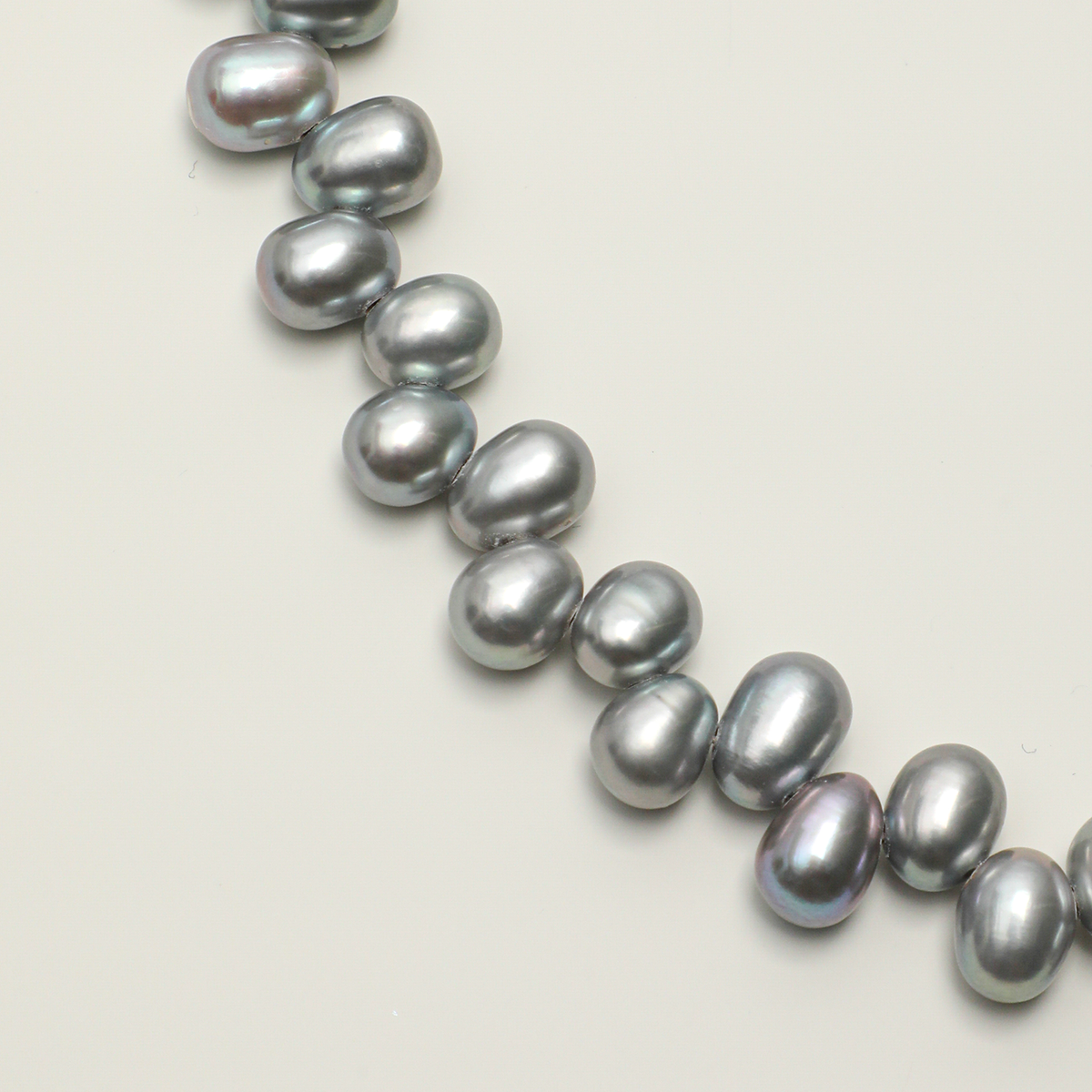 Gray freshwater pearl surface and luster detail