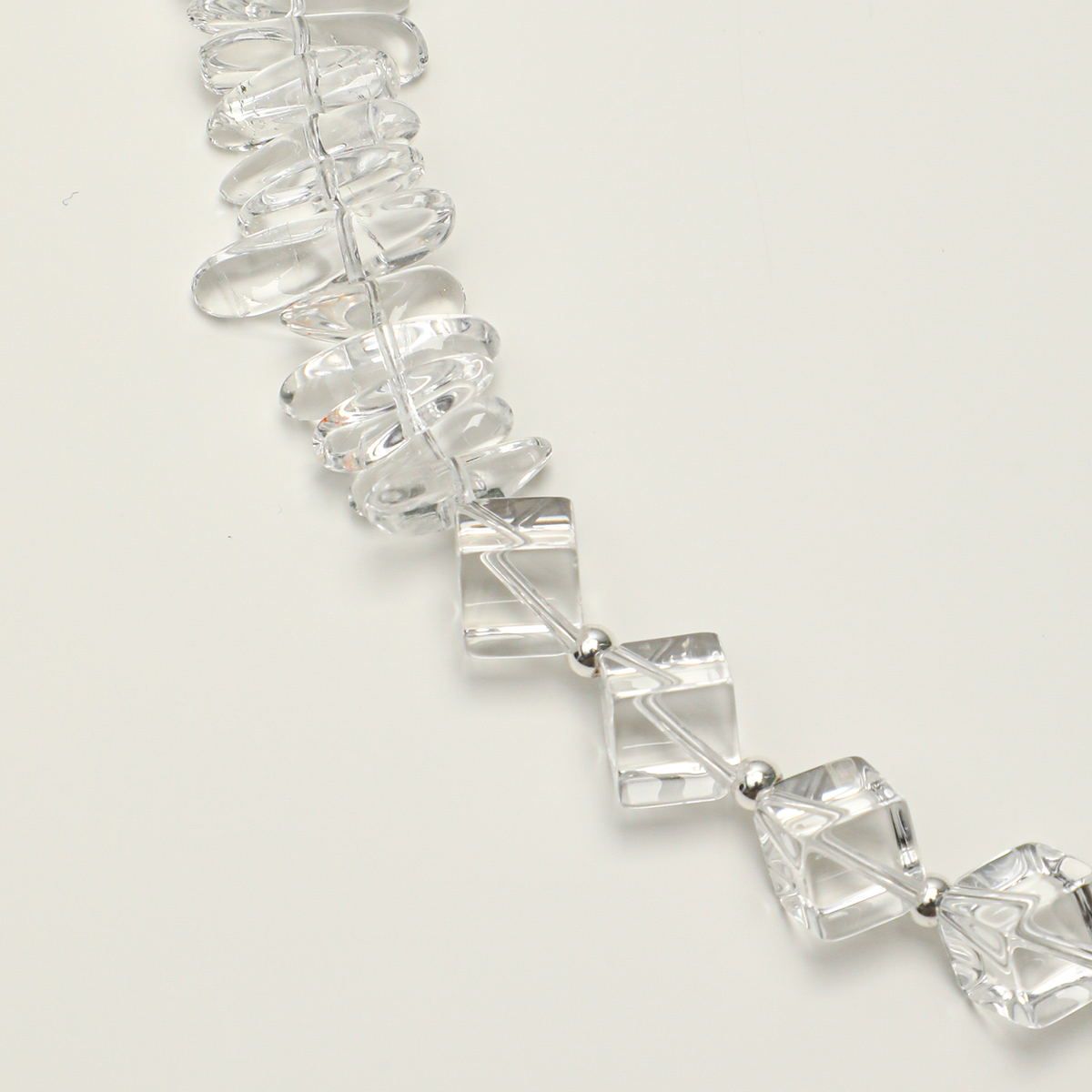 Clear quartz geometric beads and elongated stones