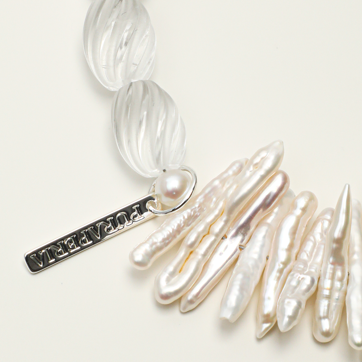 Baroque stick pearls and engraving tag detail