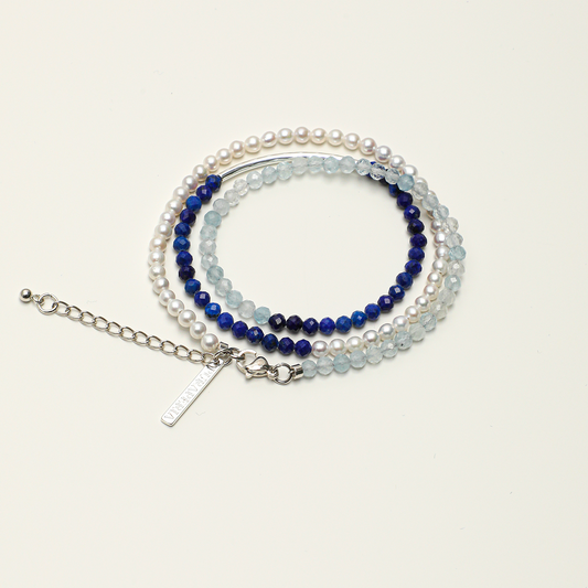 Aquamarine, lapis lazuli and pearl three-strand adjustable bracelet
