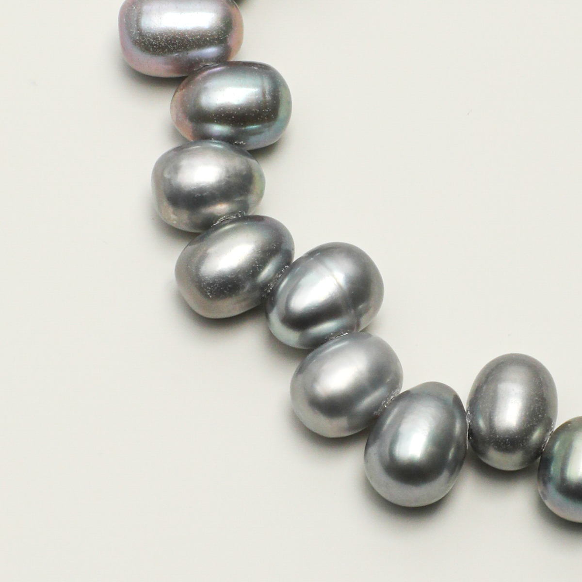 Gray rice-shaped freshwater pearl detail