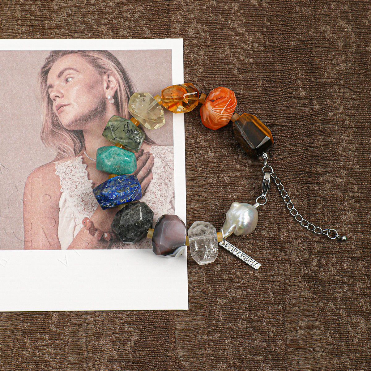 Mixed gemstone and baroque freshwater pearl bracelet in a lifestyle setting