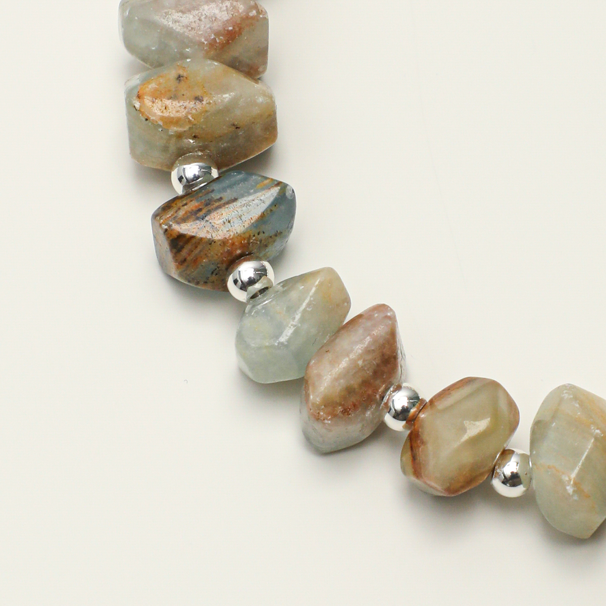 Natural Blue Luster stone discs with blue green and earthy markings