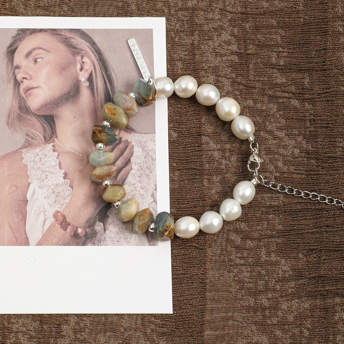 Blue Luster stone and pearl bracelet styled flat lay