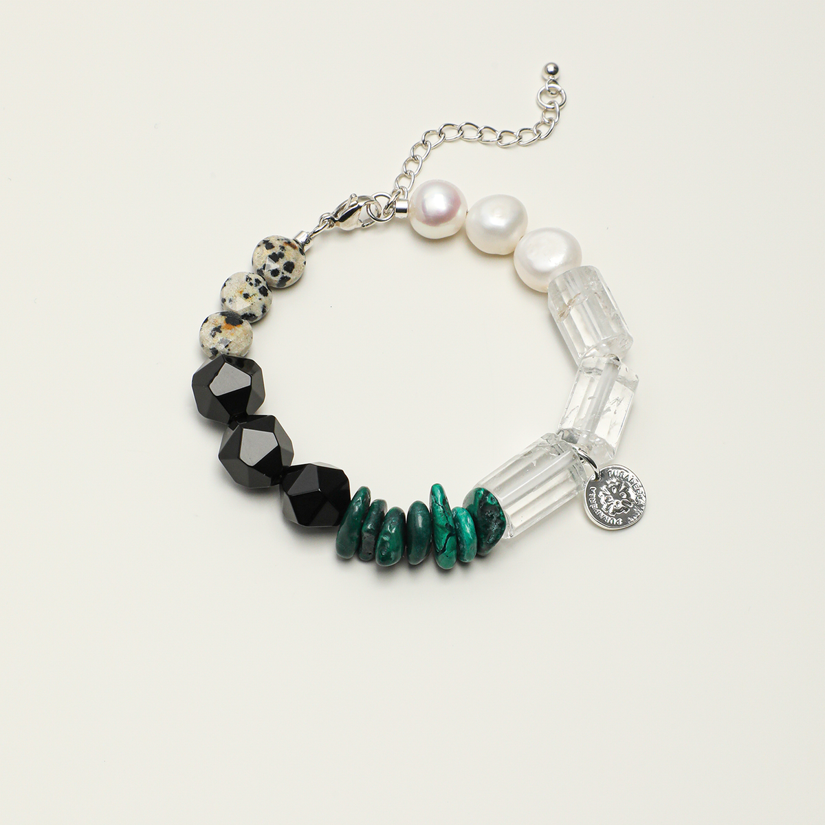 Black agate, malachite, clear quartz, spotted stone, and pearl adjustable bracelet, full product view