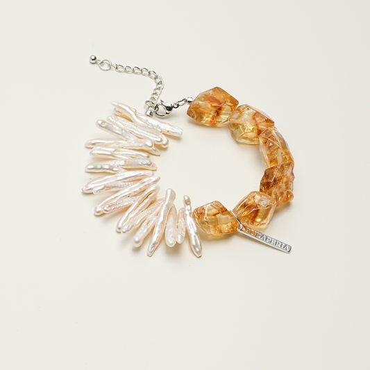 Citrine and freshwater pearl adjustable bracelet with silver-tone details