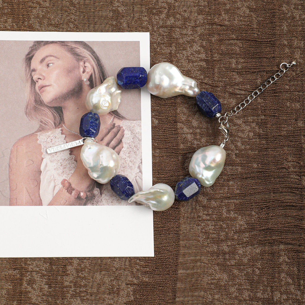 Baroque pearl and lapis lazuli bracelet in a lifestyle setting