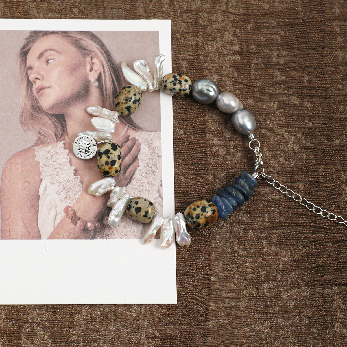 Dalmatian jasper, kyanite and baroque pearl bracelet in a lifestyle setting